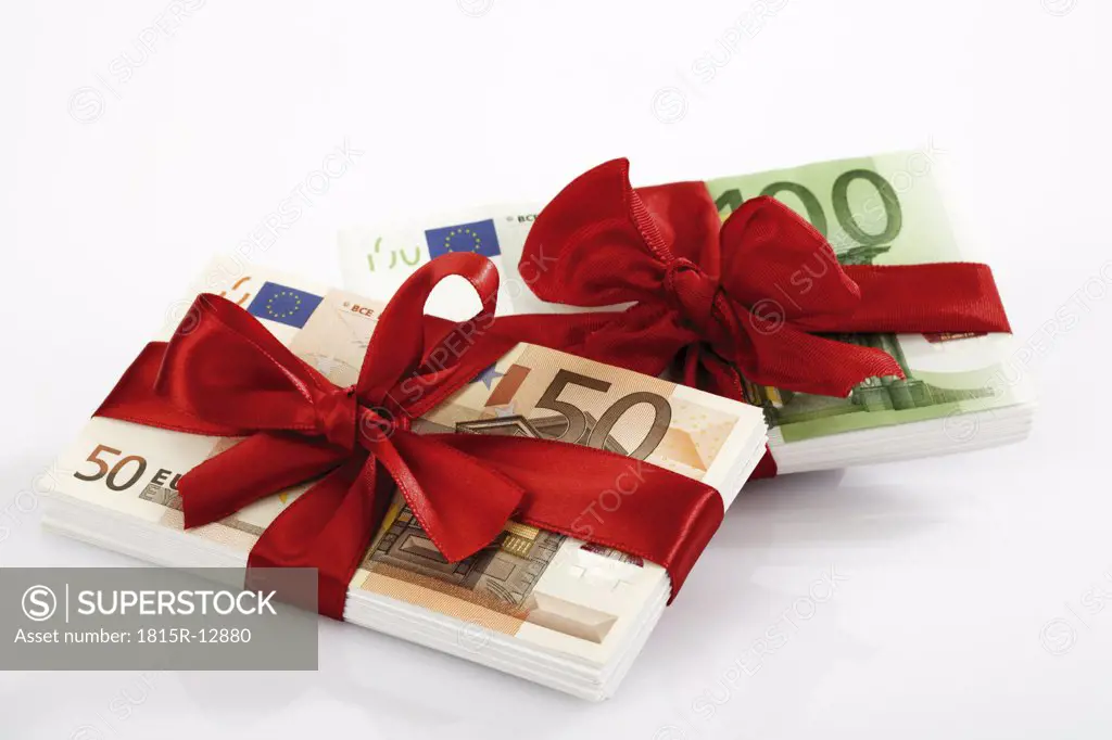 Bunches of banknotes tied as gift