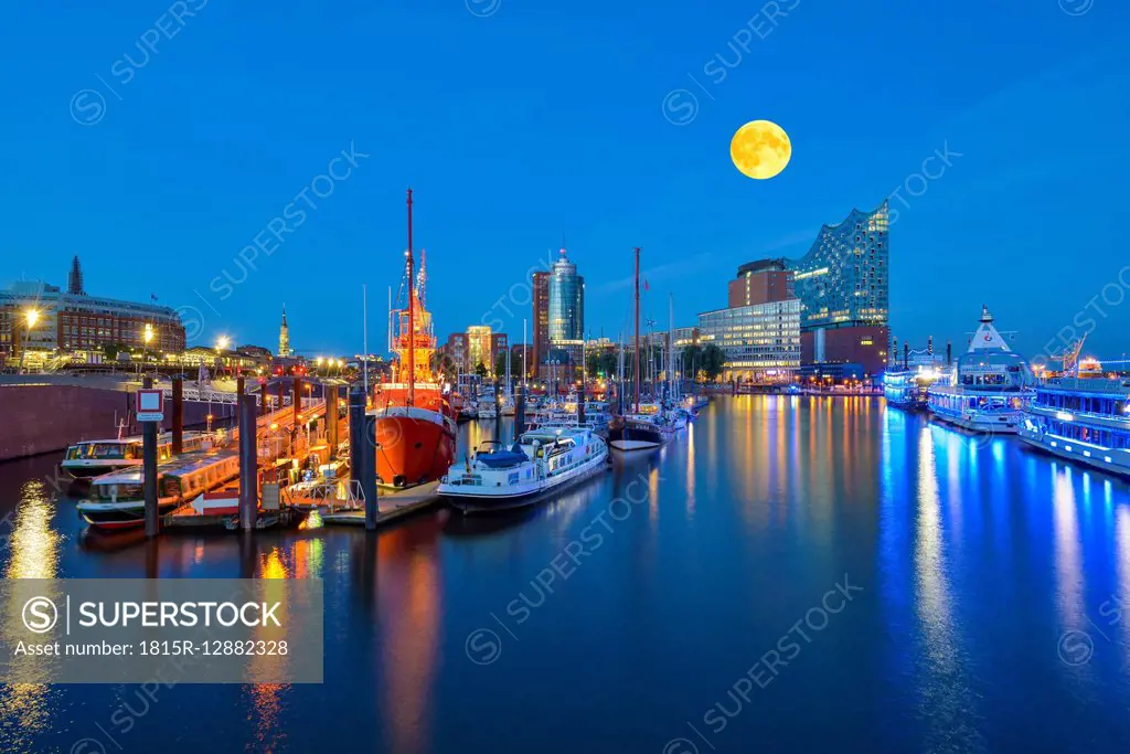 Germany, Harbour at full moon, Elbphilharmonie and Hanseatic Trade Center in background