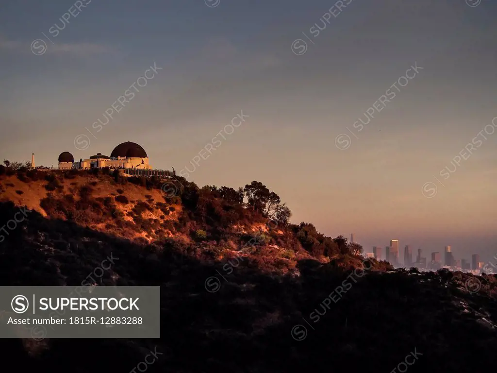 USA, Los Angeles, Griffith Observatory and city skyline at sunset