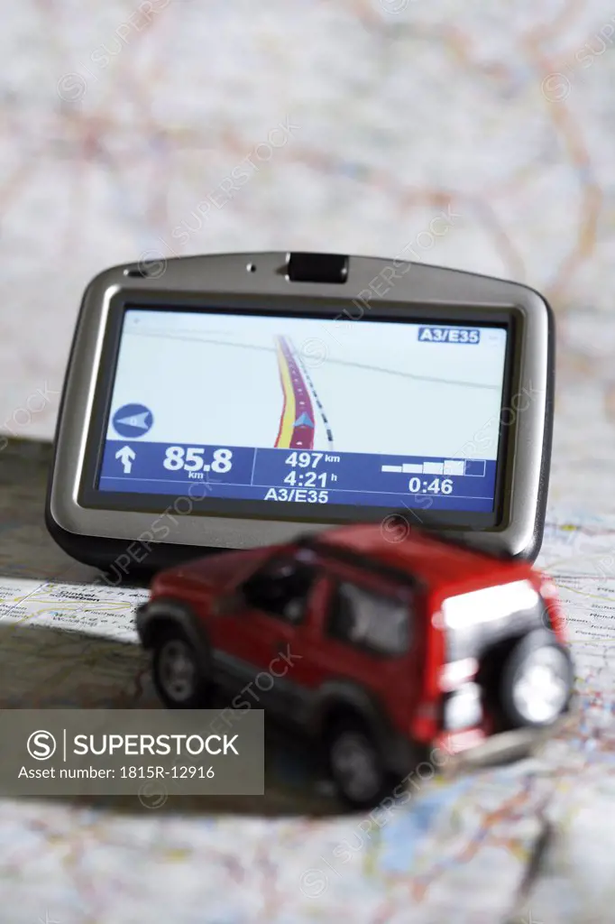 Navigation instrument and motorcar on a map