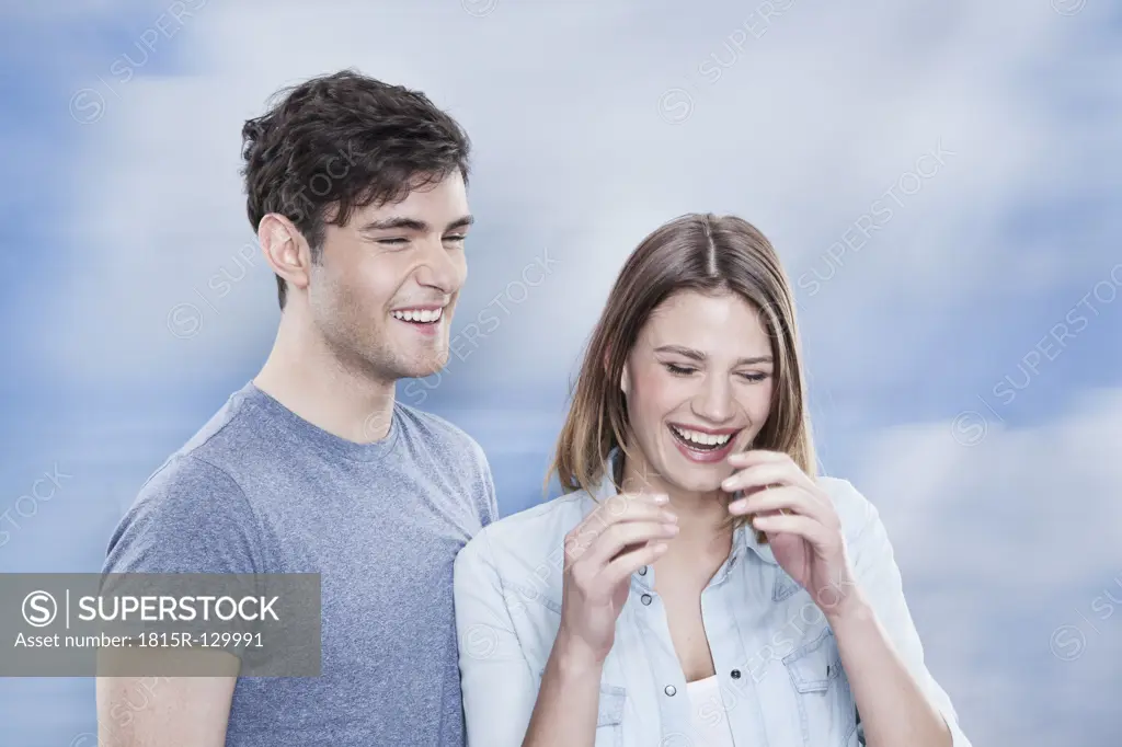 Germany, Cologne, Young couple, smiling