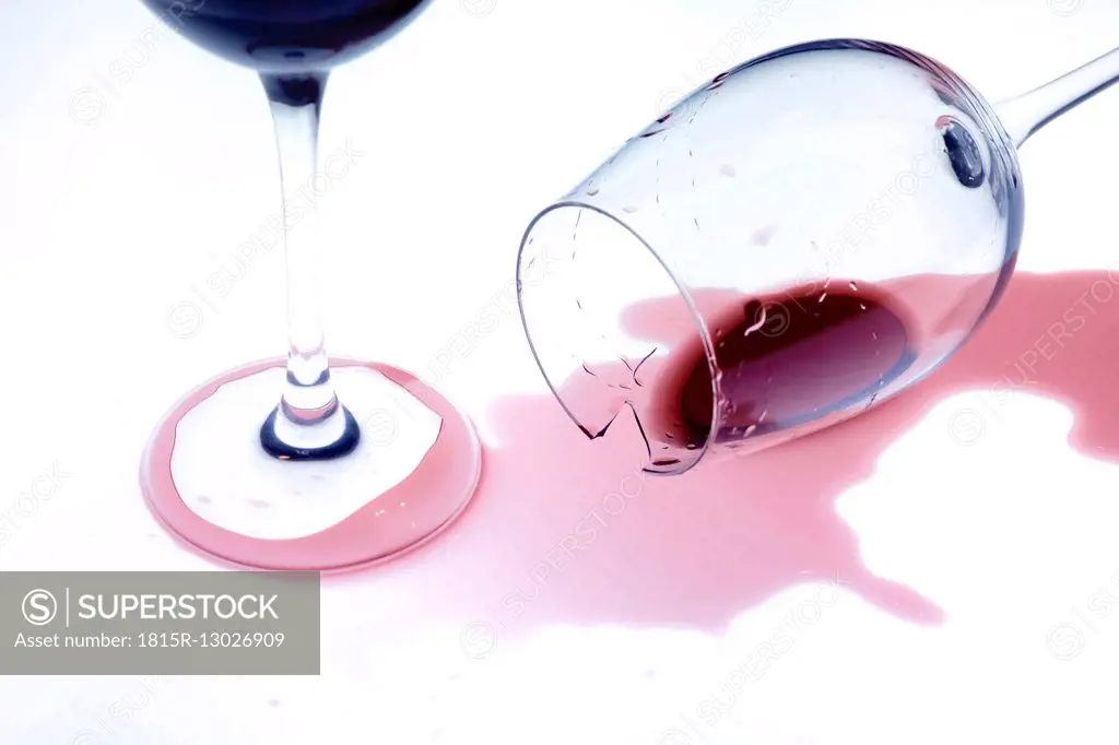 Glasses of red wine, fallen