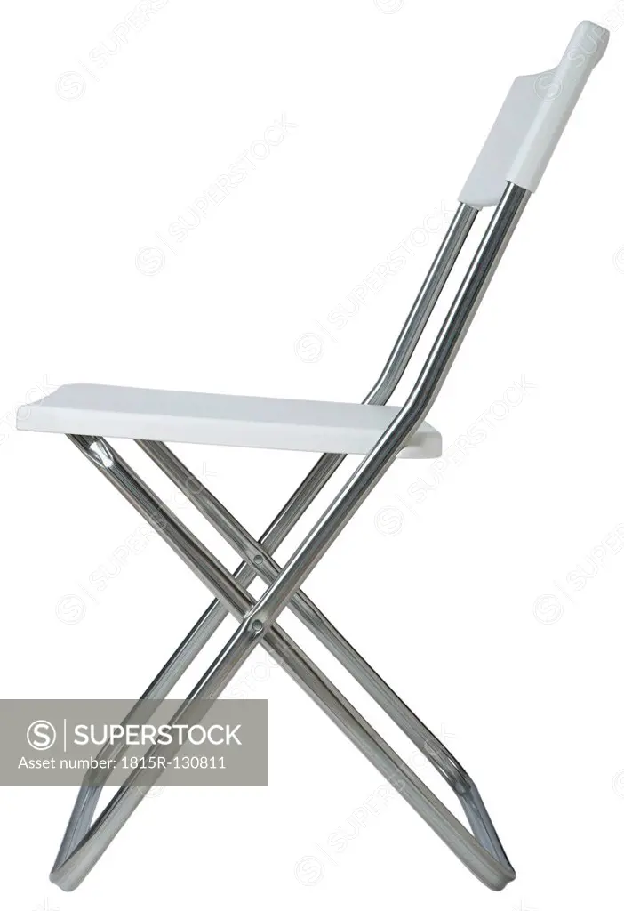 Folding chair on white background