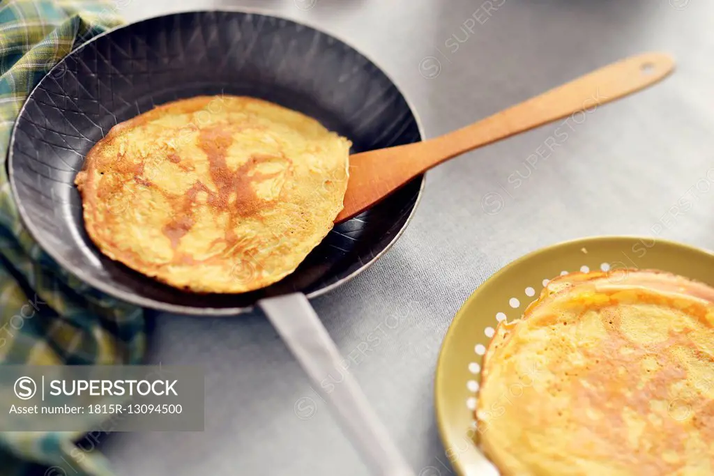 Fresh pancake in frying pan