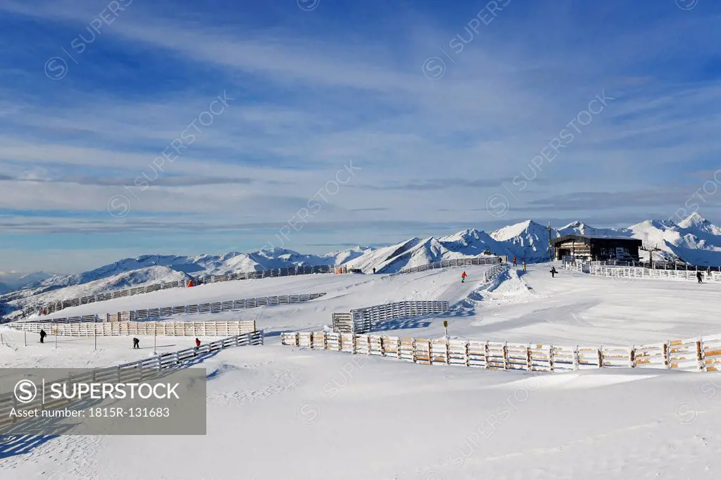 Austria, Carinthia, Salzburg, People skiing in snow
