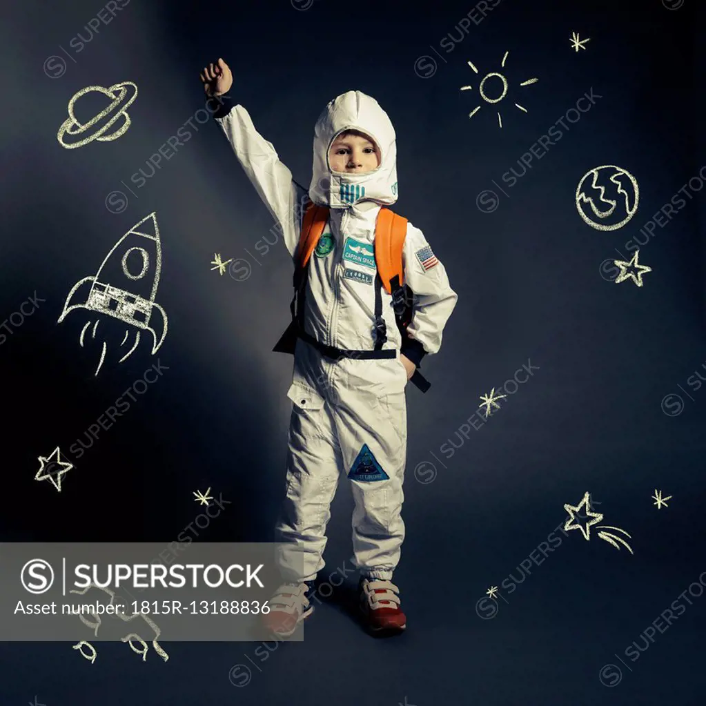 Child with spacesuit orbited by celestial bodies and luminaries
