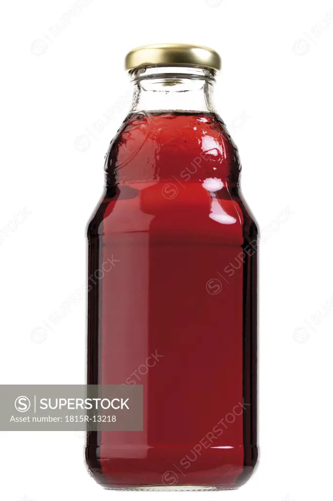 Bottle of red liquid