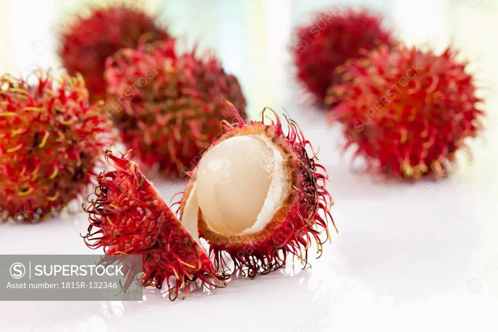 Rambutan fruits on white background, close up