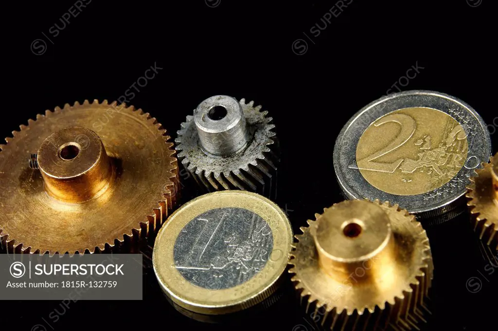 Euro coins as gearing part mechanism, close up