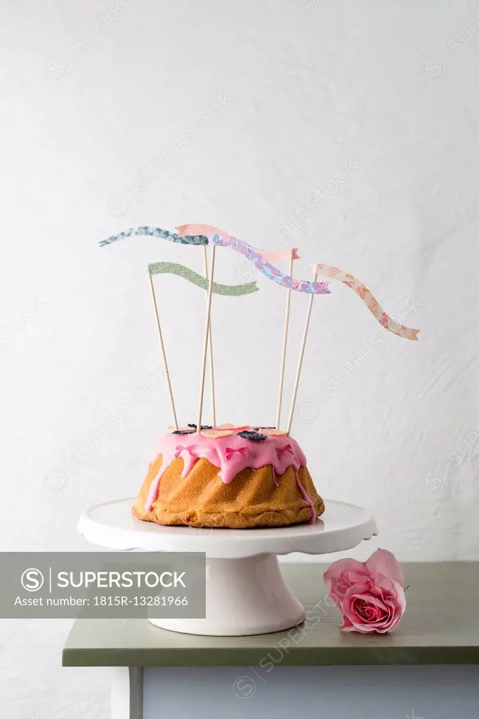 Decorated ring cake on cake stand