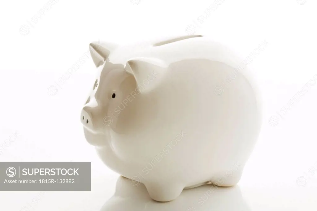 Piggy bank on white background, close up