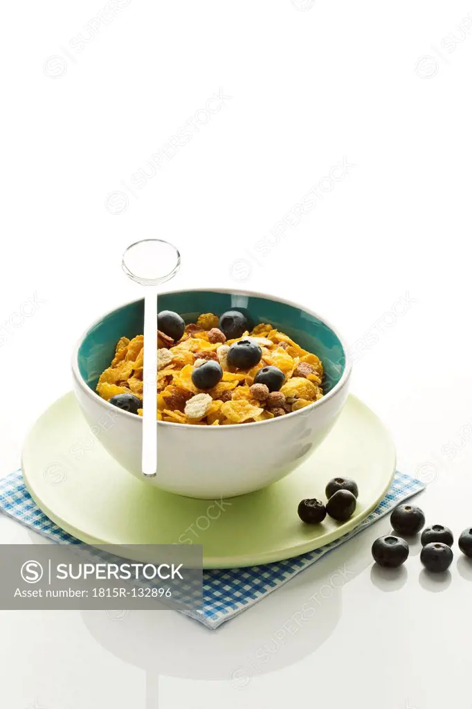 Bowl of healthy cereals on white background