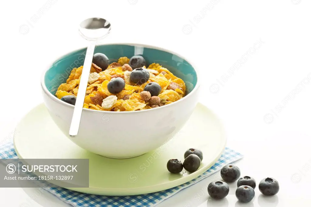 Bowl of healthy cereals on white background