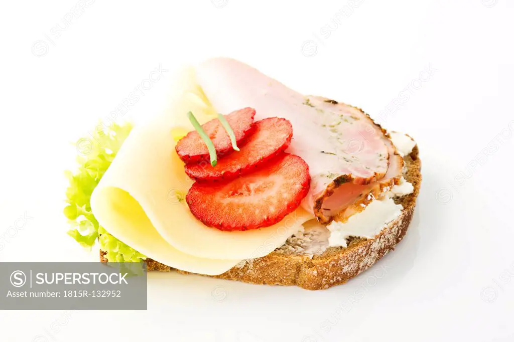 Fitness sandwich with cream cheese, salad, cheese and ham on white background, close up