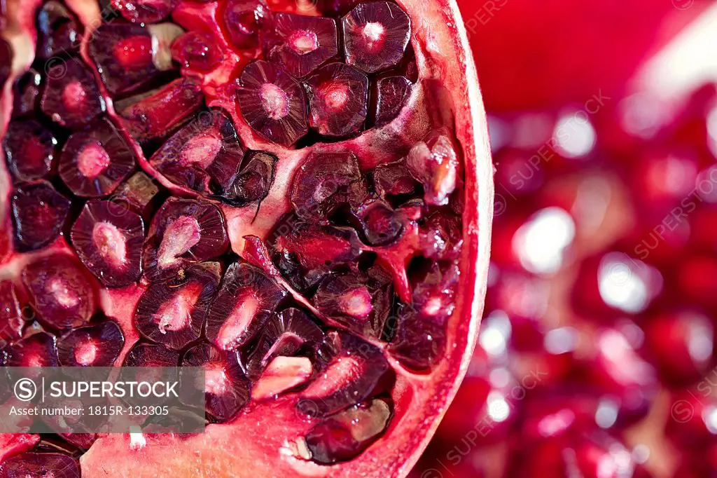 Slice of fresh pomegranate, close-up