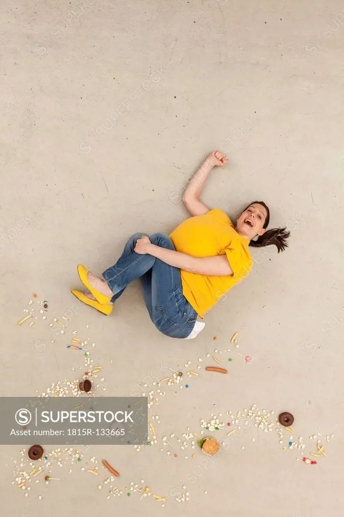Woman falling above food