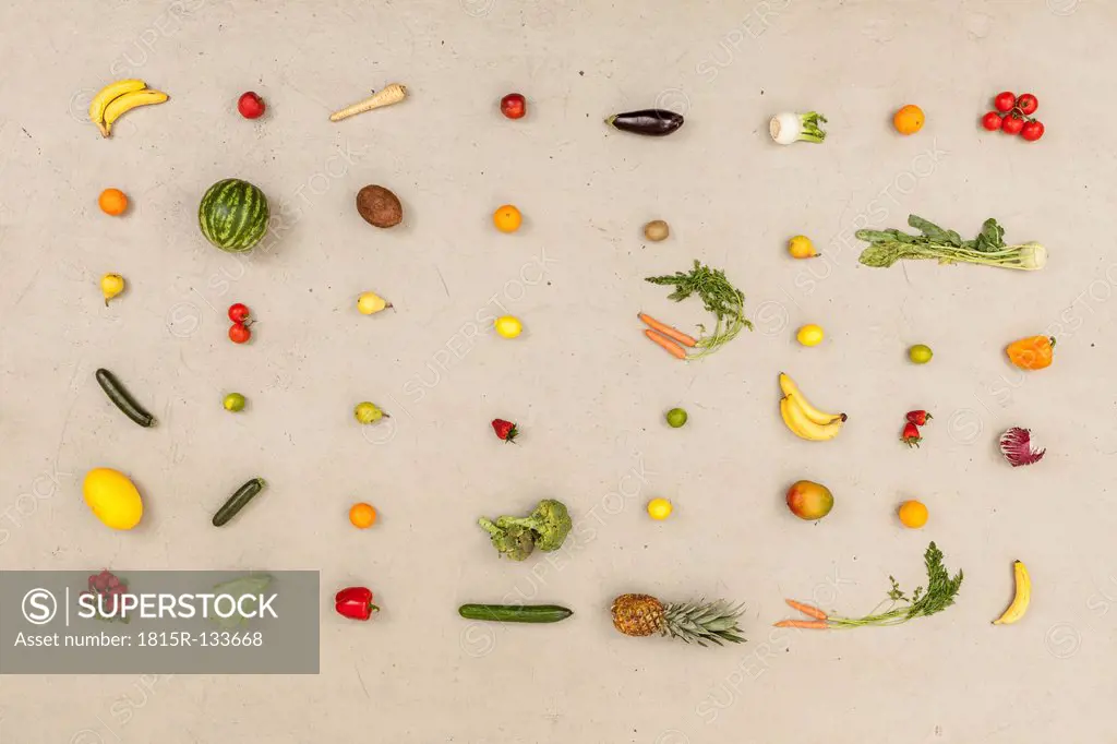 Variety of vegetables and fruits on beige background