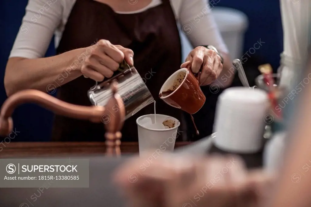 Barista preparing iced coffee