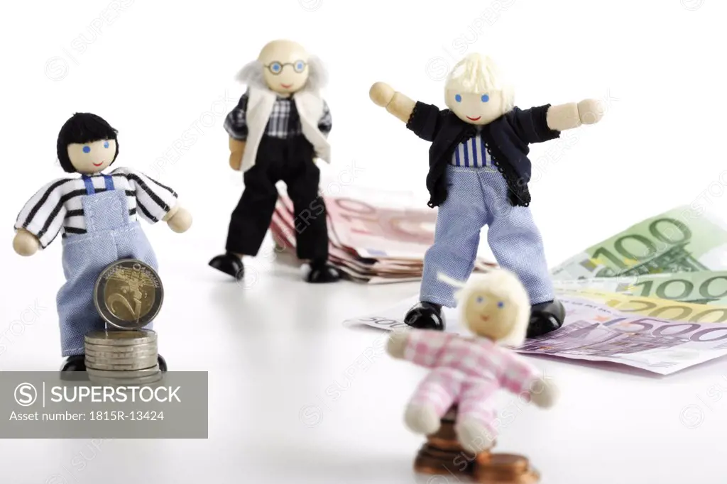 Figurine familiy with Euro notes and coins