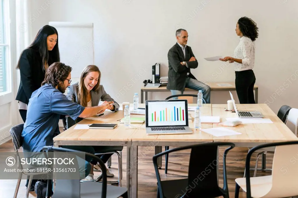 Business people having a team meeting in office