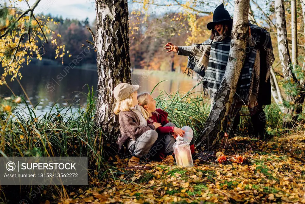 Hansel and Gretel, Witch scaring boy and girl sitting in forest