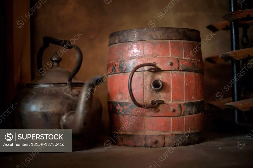 Wine barrel and old kettle