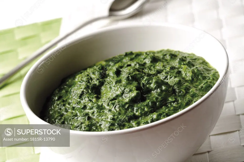 Spinach in bowl, tilt view