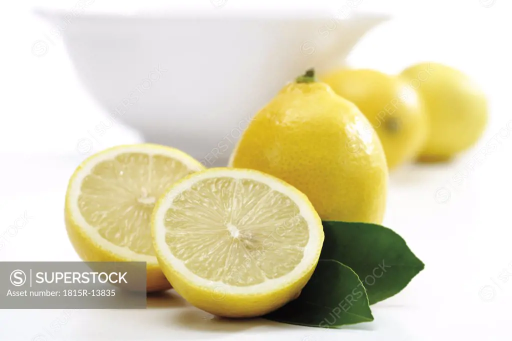 Lemons in front of bowl