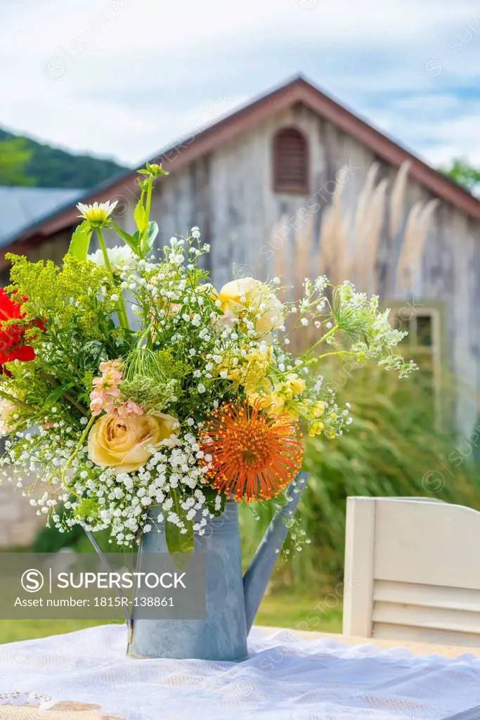 USA, Texas, Flower bouquet in watering can