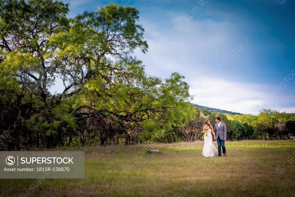 USA, Texas, Bride and groom at wedding ceremony