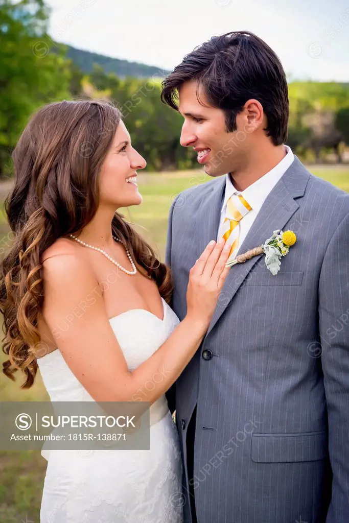 USA, Texas, Bride and groom at wedding ceremony