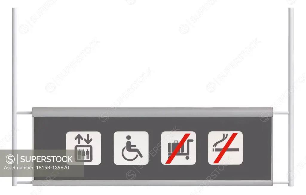 Lift, wheel chair, no trolleys, non smoking on information plate, close up