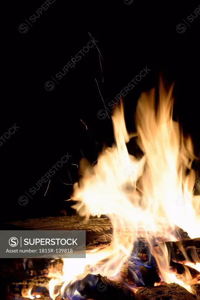 Burning campfire at night