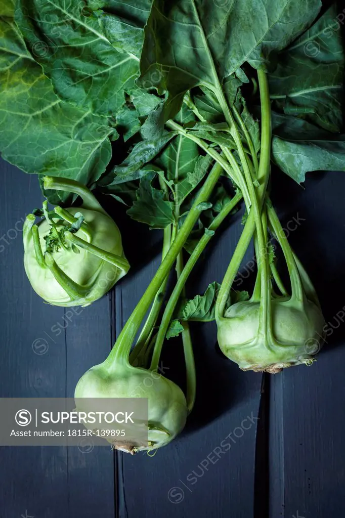 Cabbage turnips on wooden table, close up
