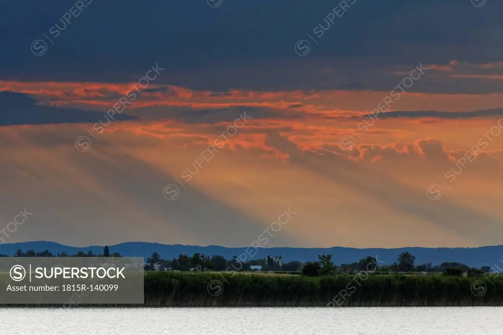 Austria,Burgenland, View of Neusiedler See Seewinkel National park at sunset