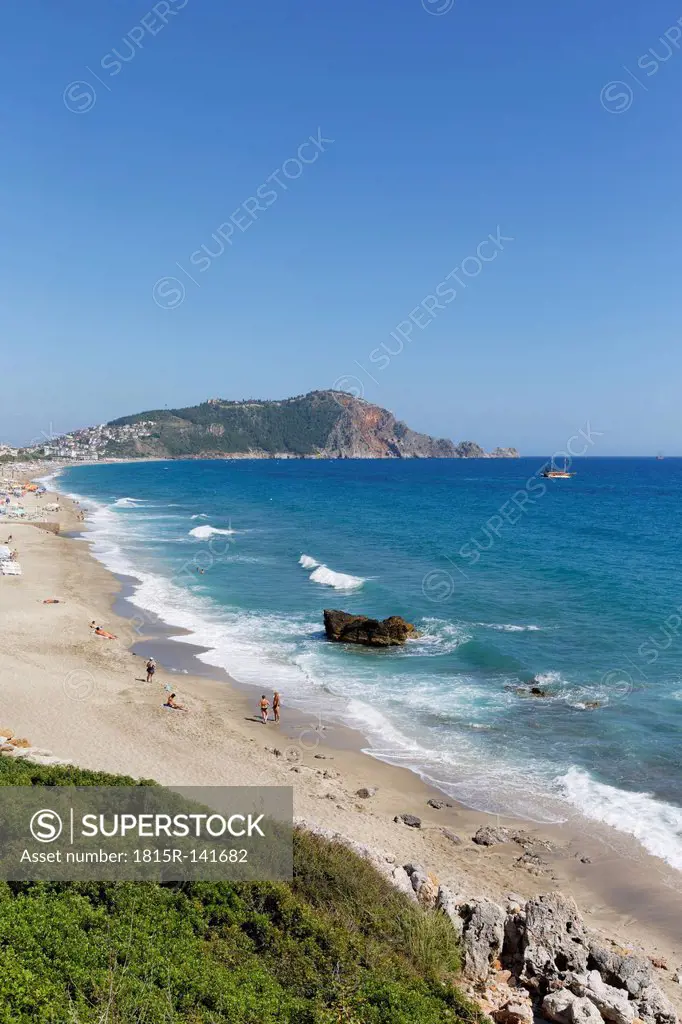 Turkey, Alanya, View of Cleopatra Beach and castle in background