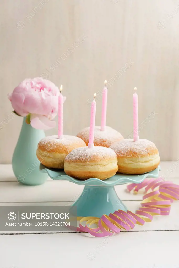 Birthday candles on Bismarck Doughnuts