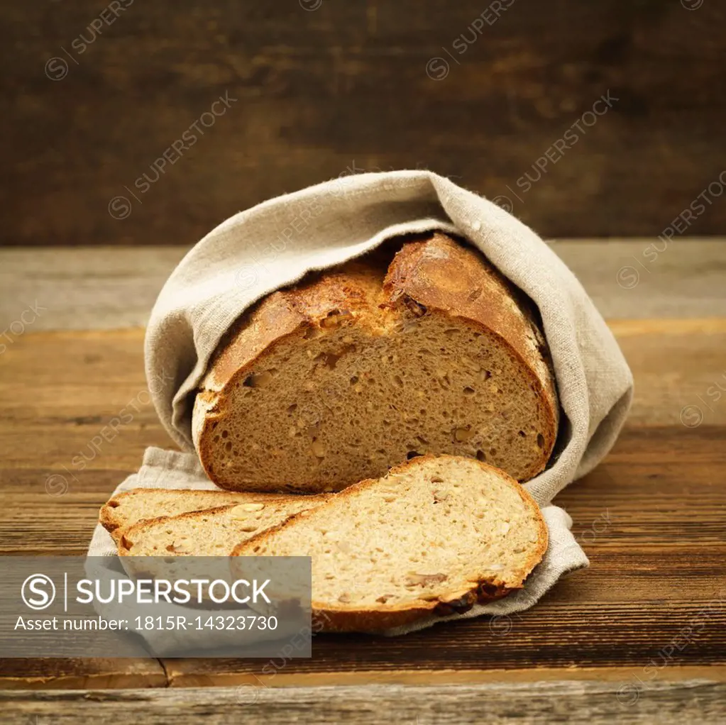Sliced bread in linen cloth