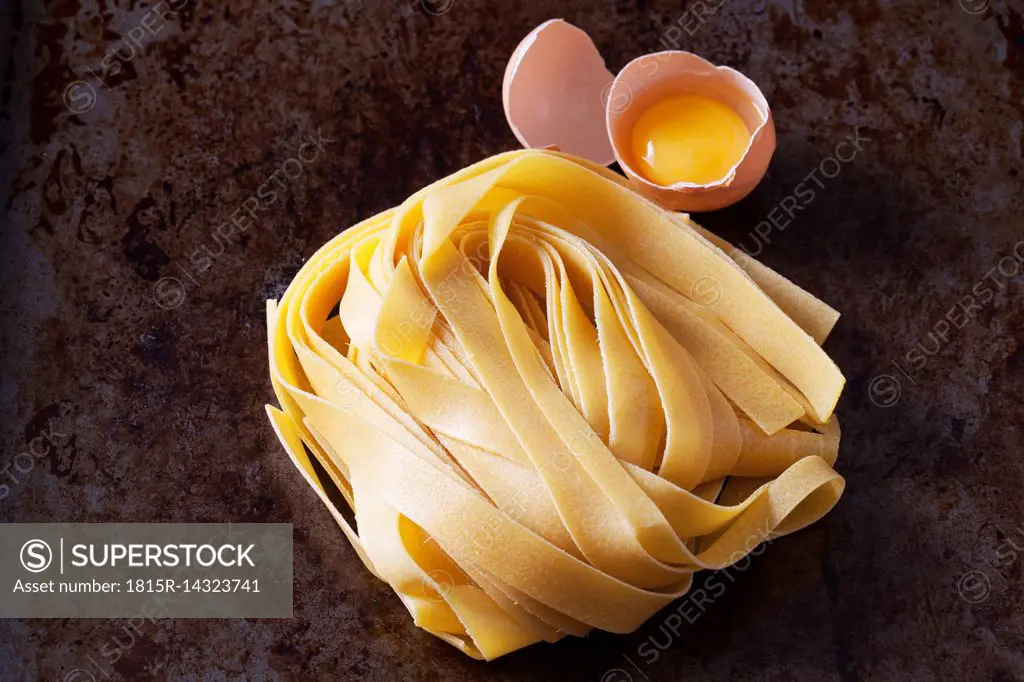 Raw Pappardelle pasta and egg