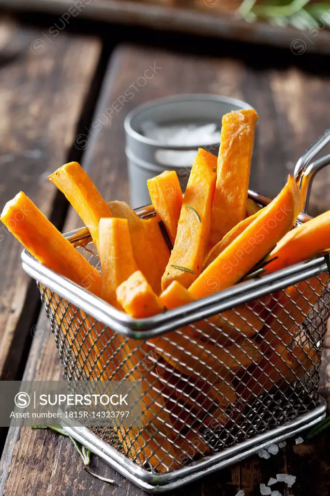 Sweet potato fries with rosmary in chip basket