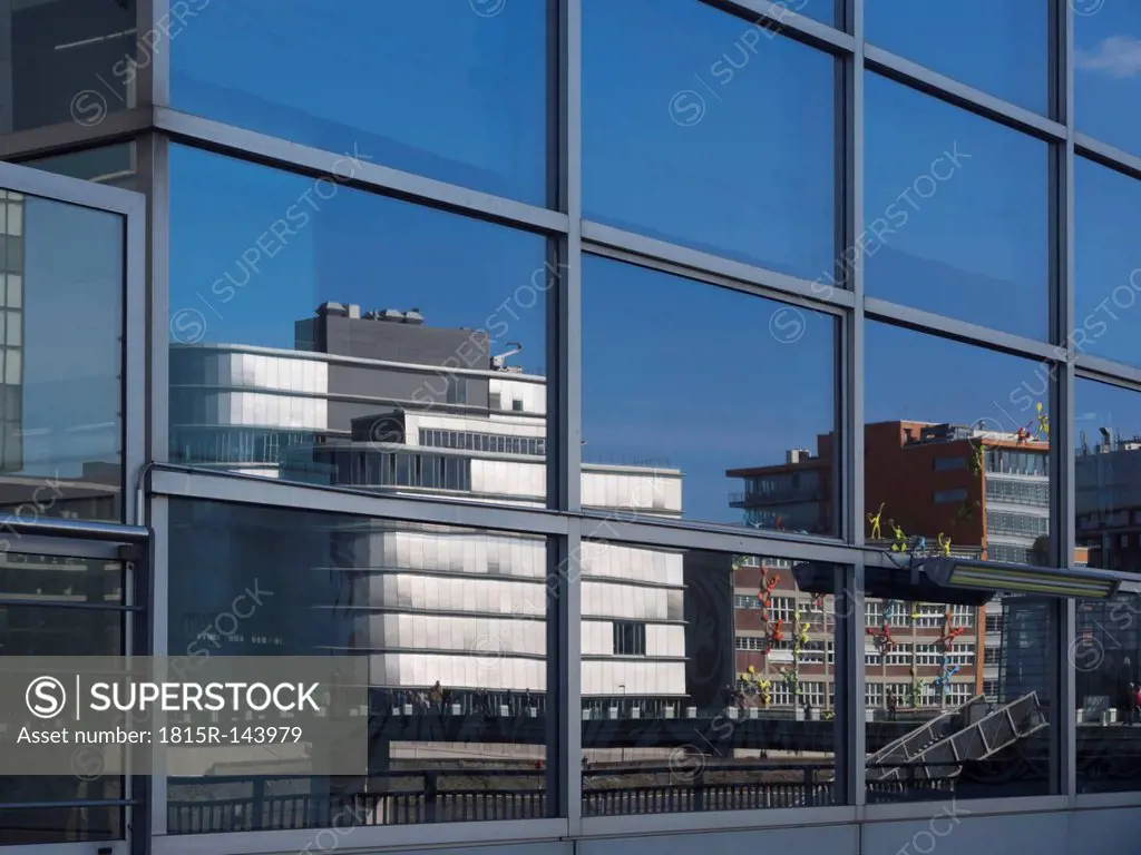 Germany, North Rhine Westphalia, Duesseldorf, Reflection of media harbour buildings