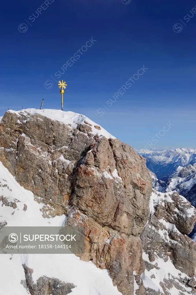 Germany, Bavaria, View of summit cross at Zugspitze Mountain