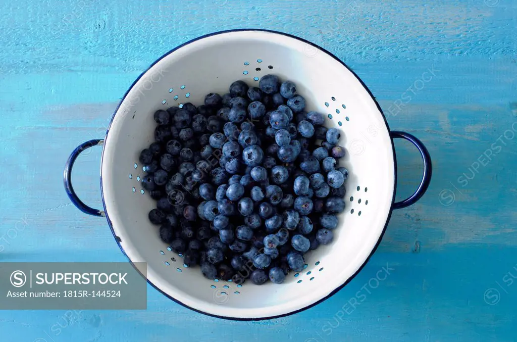 Blueberries in white colander, close up