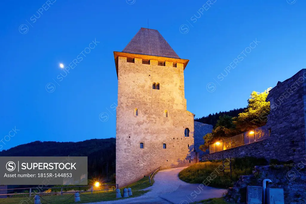 Austria, Carinthia, View of castle at dusk