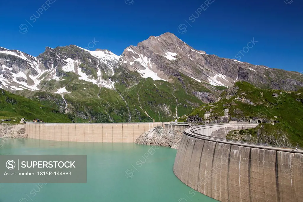 Austria, Mooserboden with masonry dam, the lake Mooserboden and peak Kitzsteinhorn