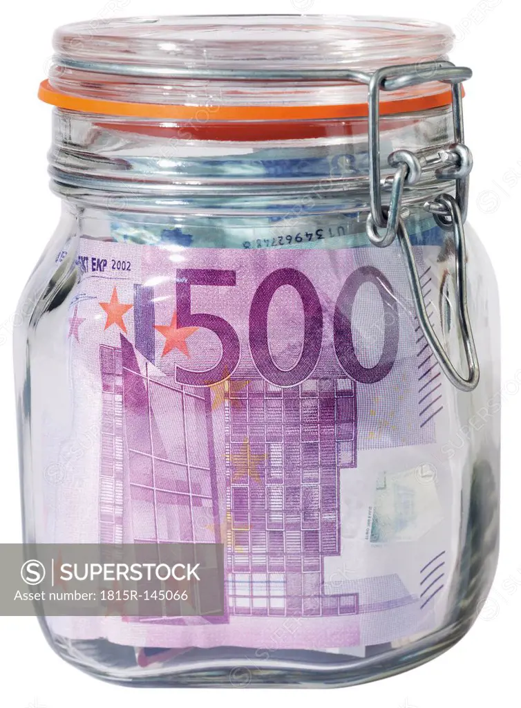 Euro note in glass jar