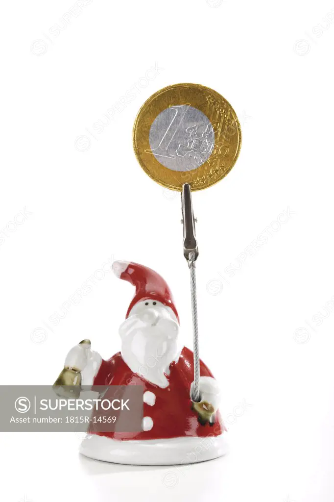 Santa Claus Figurine holding Euro coin