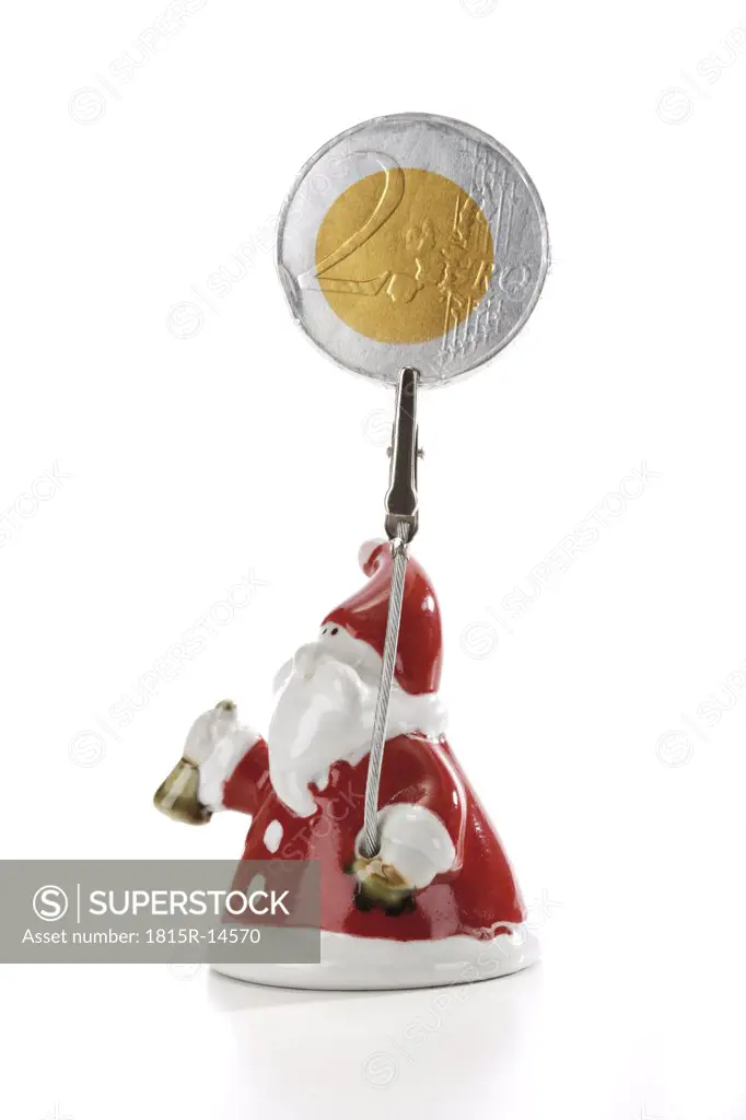 Santa Claus Figurine holding Euro coin