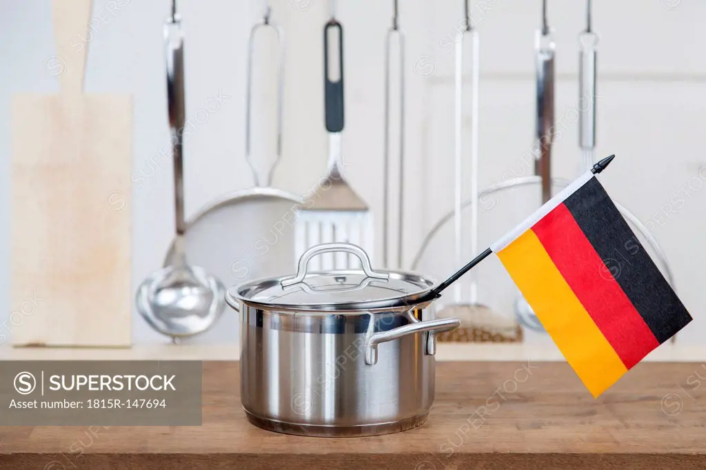 A cooking pot with a german flag in the kitchen