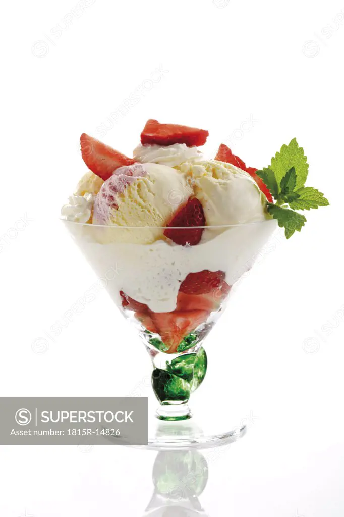 Icecream with strawberries, close-up